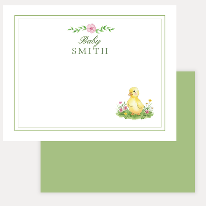 Baby stationery with a yellow duckling and floral design with a green back and personalized name