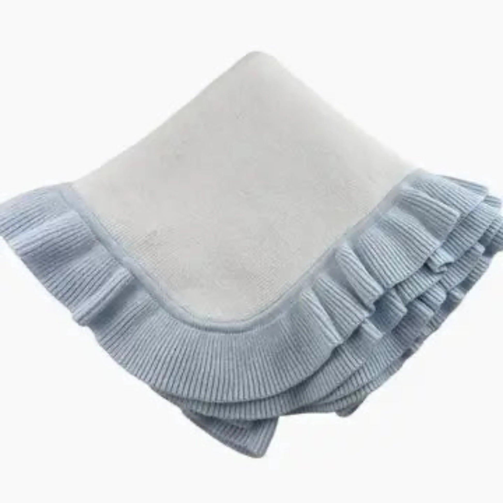 Knit baby blanket with a blue ruffled border