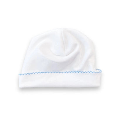 A white knit baby beanie hat with a folded cuff featuring light blue zigzag picot sticking