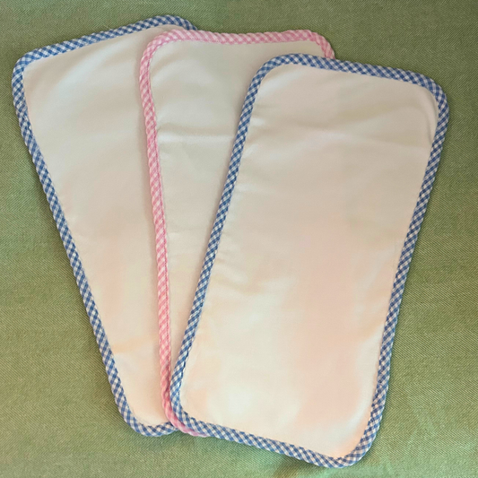 White Burp Cloths with blue and pink gingham borders