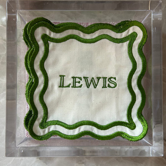Monogram Scallop linen napkins embroidered with custom name and a green wavy border