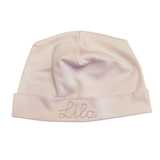  pink baby hat with the name embroidered in pink script on the front cuff perfect for newborns 
