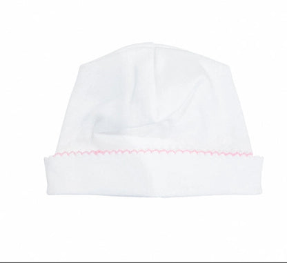 A white baby hat with a folded cuff featuring delicate pink picot trim