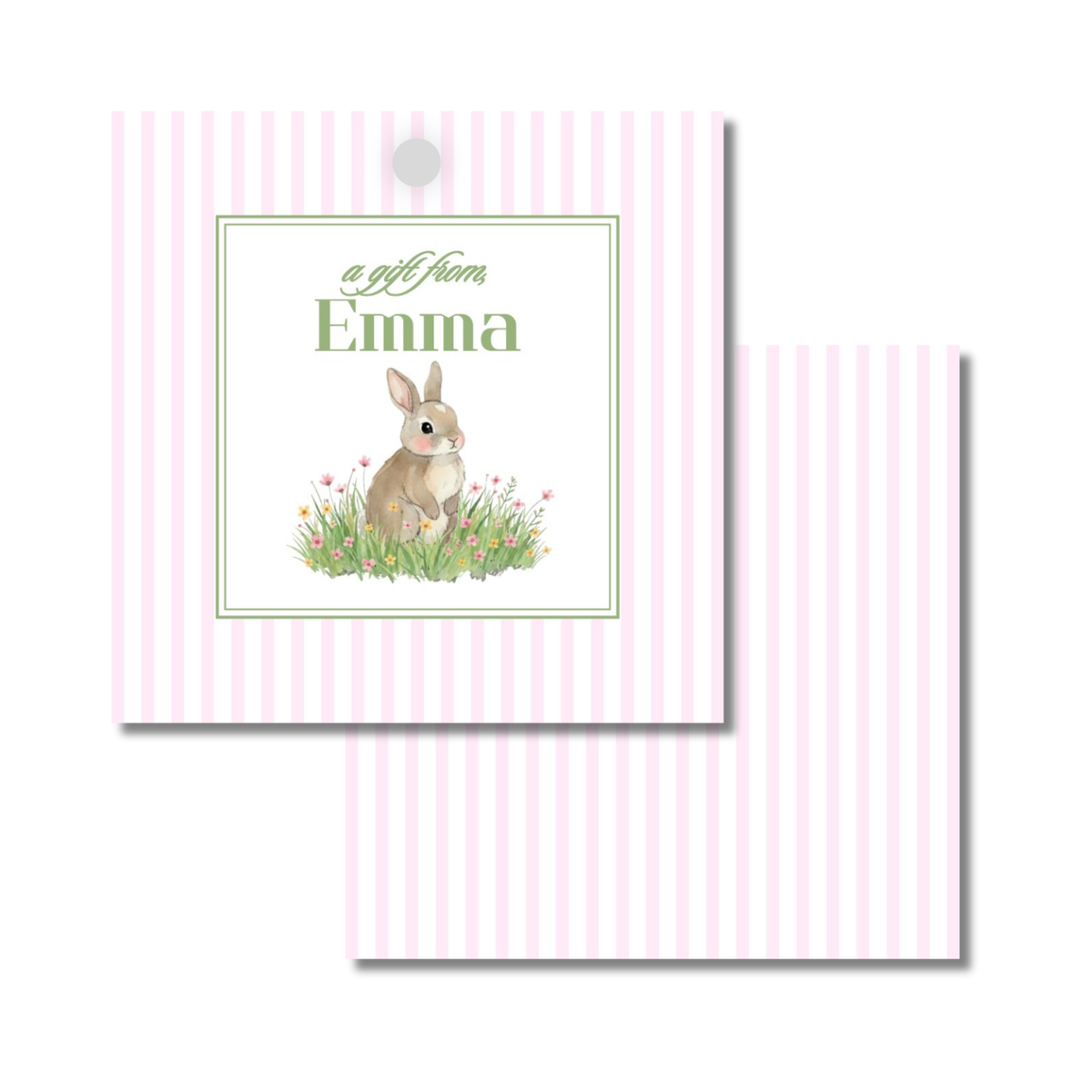 A personalized gift tag with a pink and white tripe pattern. The front features a bunny sitting in grass with small pink flowers and custom name.