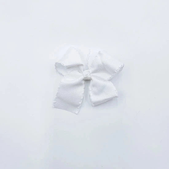 A small white bow with trim