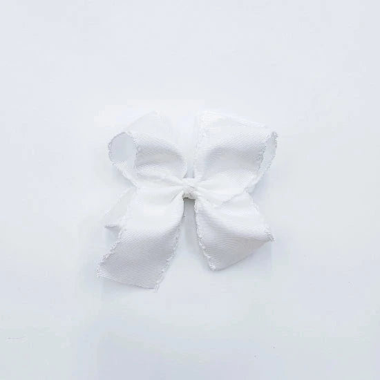white fabric hair bow with white trim