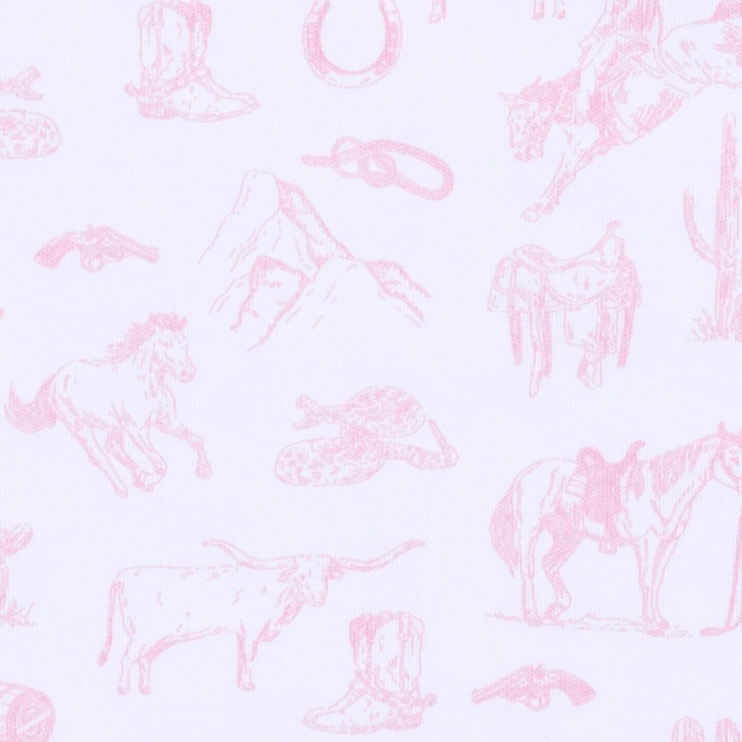 A close-up of a white fabric with a light pink western-themed toile pattern featuring horses, boots, hats, mountains, and a cowboy rifle.